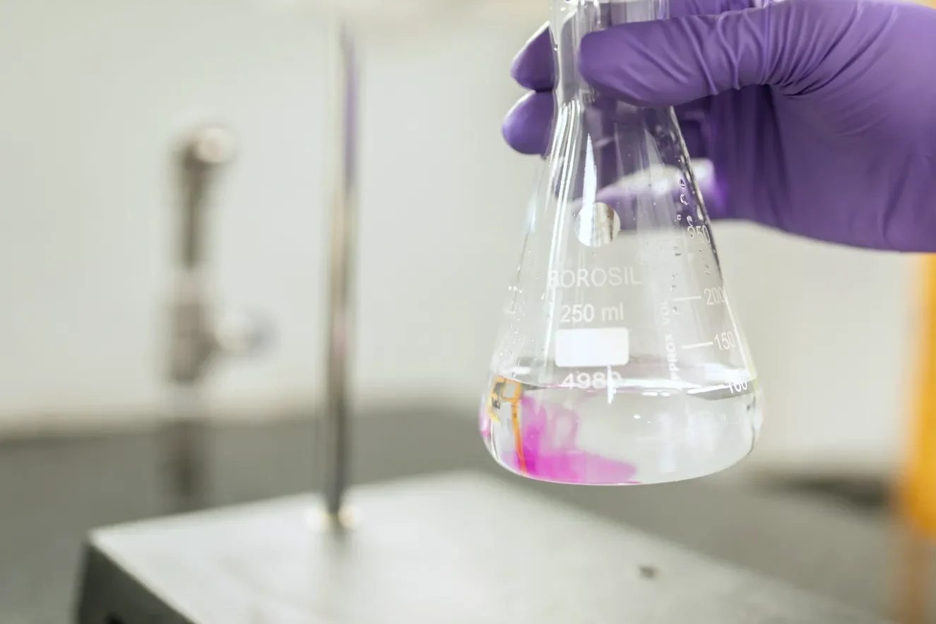 Analyst reviewing a sample in the ModernVEDA laboratory